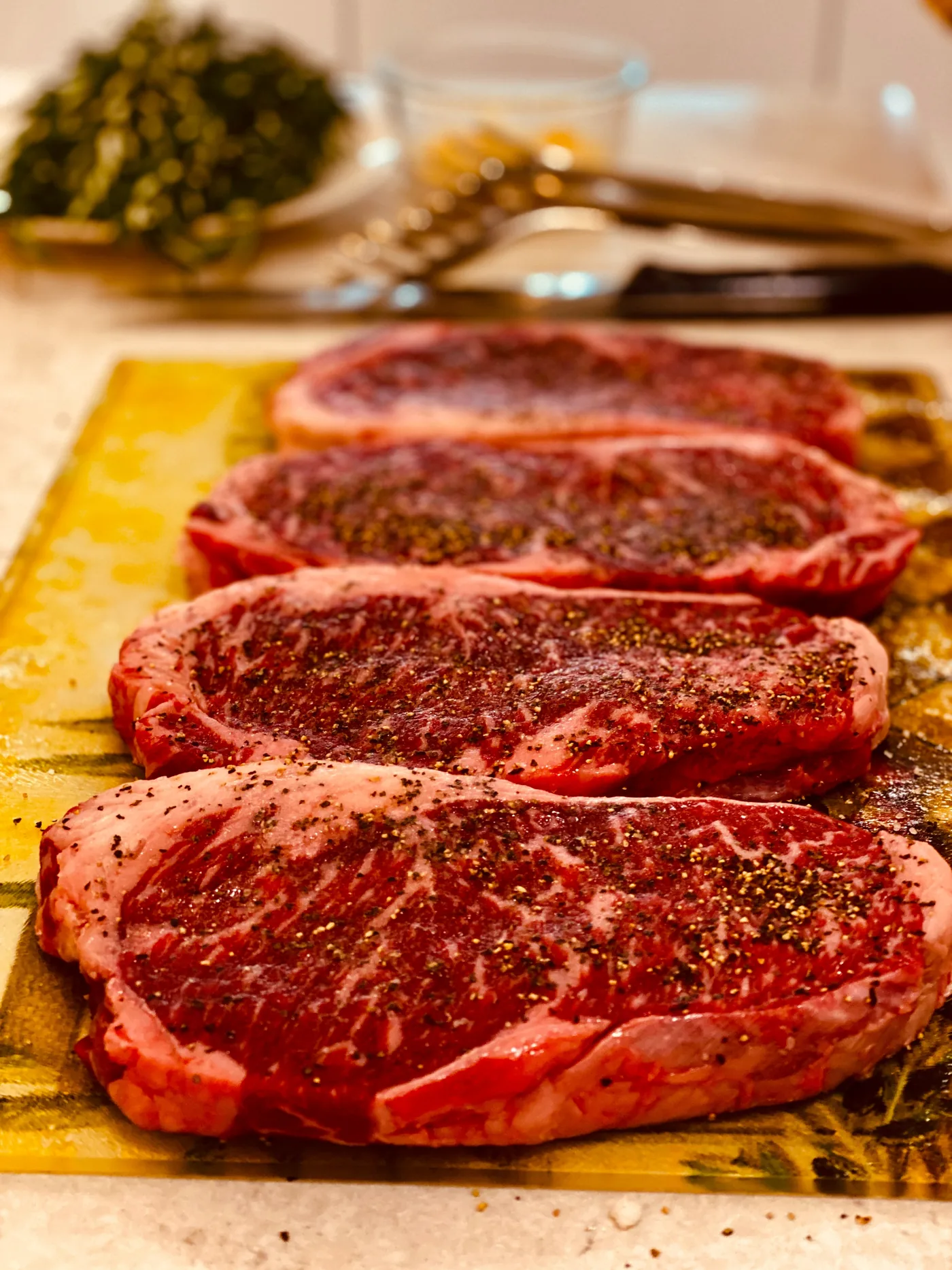 Seasoned beef steaks of the kind inspected on a Detectronic tunnel detector before packing