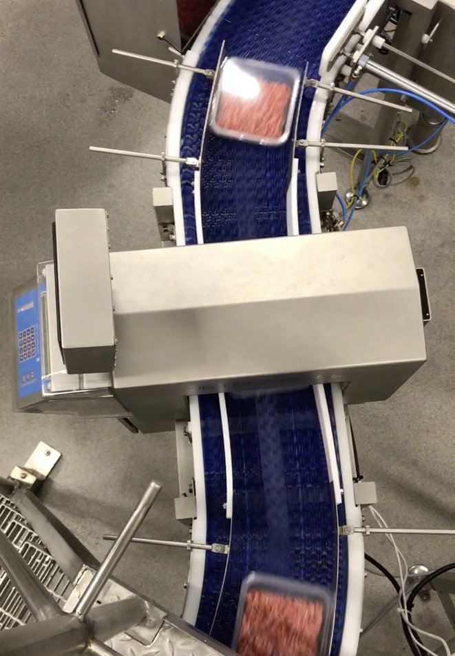 Detectronic conveyor with retracting belt reject